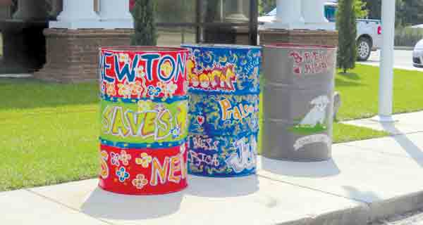 Barrels, like the ones shown here, are located throughout the city in high-traffic areas to help eliminate litter in the community. The barrels are part of the 'Brewton Reborn' project now underway in the community.
