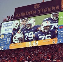 This photo is featured on Cooper’s Facebook page and shows him with the late AU football player.