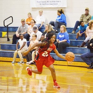 BMS’s Janazsia Nettles dribbles for a fast break point. Nettles had 19 points for the game.