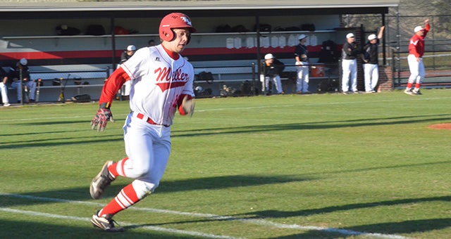 Corey Williams | The Brewton Standard Miller's Jake Najor rounds first base on a two RBI double down the third base line in the fourth inning.