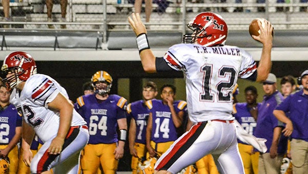 Courtesy photo No. 12 Caleb Winton  throws against Tallassee last season. The Tigers ended up winning the close game 17-14, the team’s first win of the season.