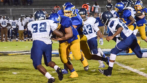 Corey Williams | The Brewton Standard Neal running back Zachary Baxter gets a lead block by Josh McMillan on Friday.