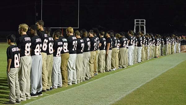Corey Williams | The Brewton Standard Cheerleaders and players honor loved ones affected by cancer by wearing names on back of Legacy jerseys.