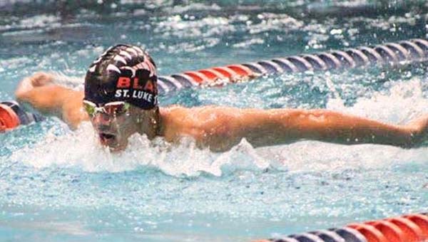 Courtesy photo Colby Morris swims the 100 fly in Auburn. Morris set a personal best time in the event.