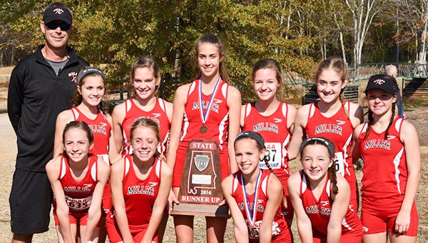 Courtesy photo Pictured is the T.R. Miller XC team at state in Oakville. The team finished in second place. Senior Allie Nelson (center) led all in the girls' division with a time of 18:53.29.