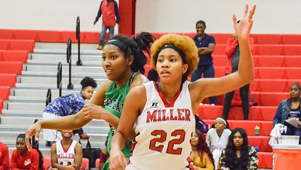 Corey Williams | The Brewton Standard Kyla Bell-Barton gets position in the post against Choctaw. Miller won in overtime  47-43. Bell-Barton finished the game with a team-high 16 points. 