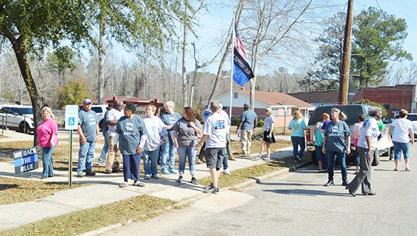 Stephanie Snodgrass | The Brewton Standard More than 20 residents gathered to show their support for the Castleberry Police Department Monday. 